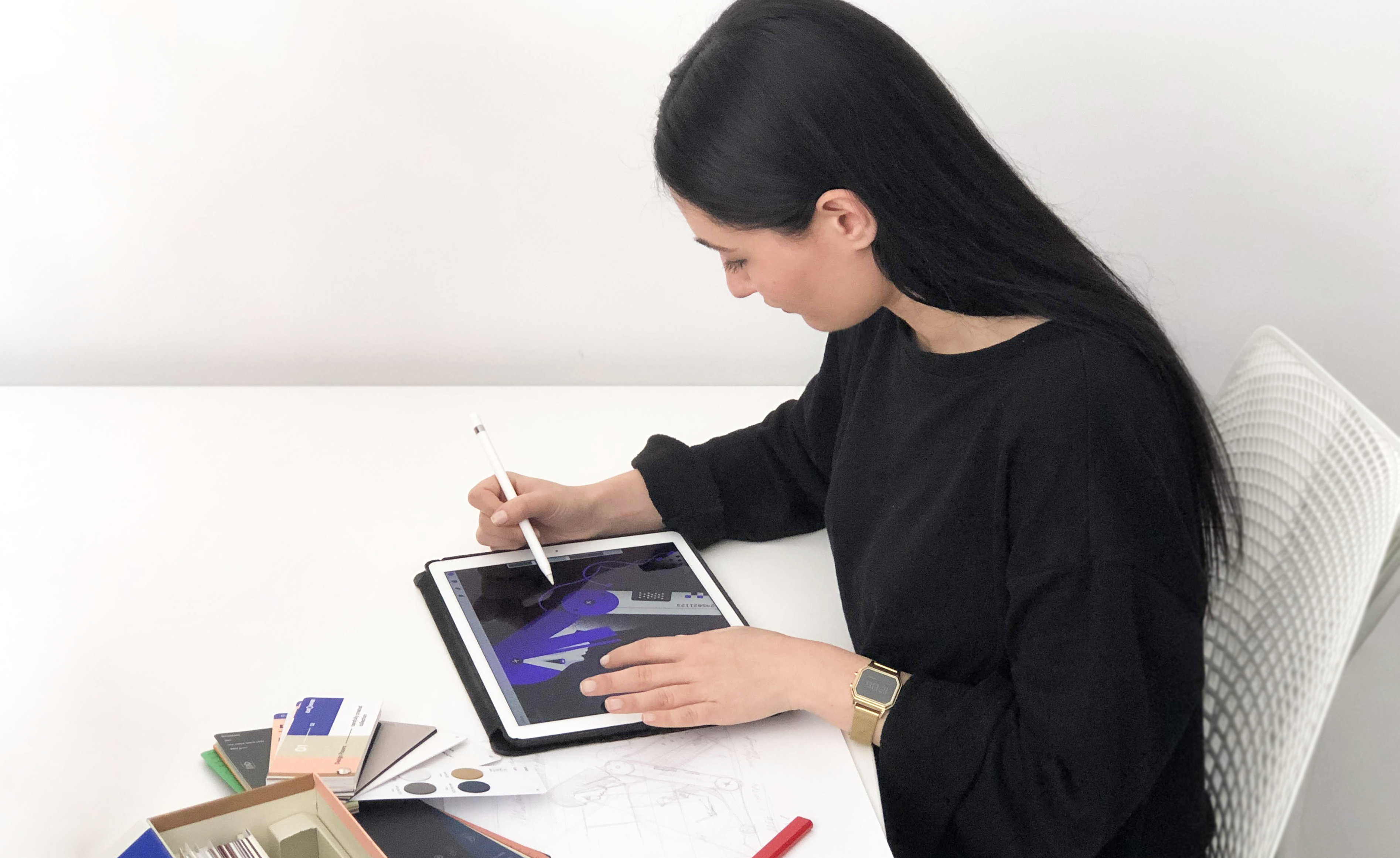 Dragana illustrating on her iPad. 