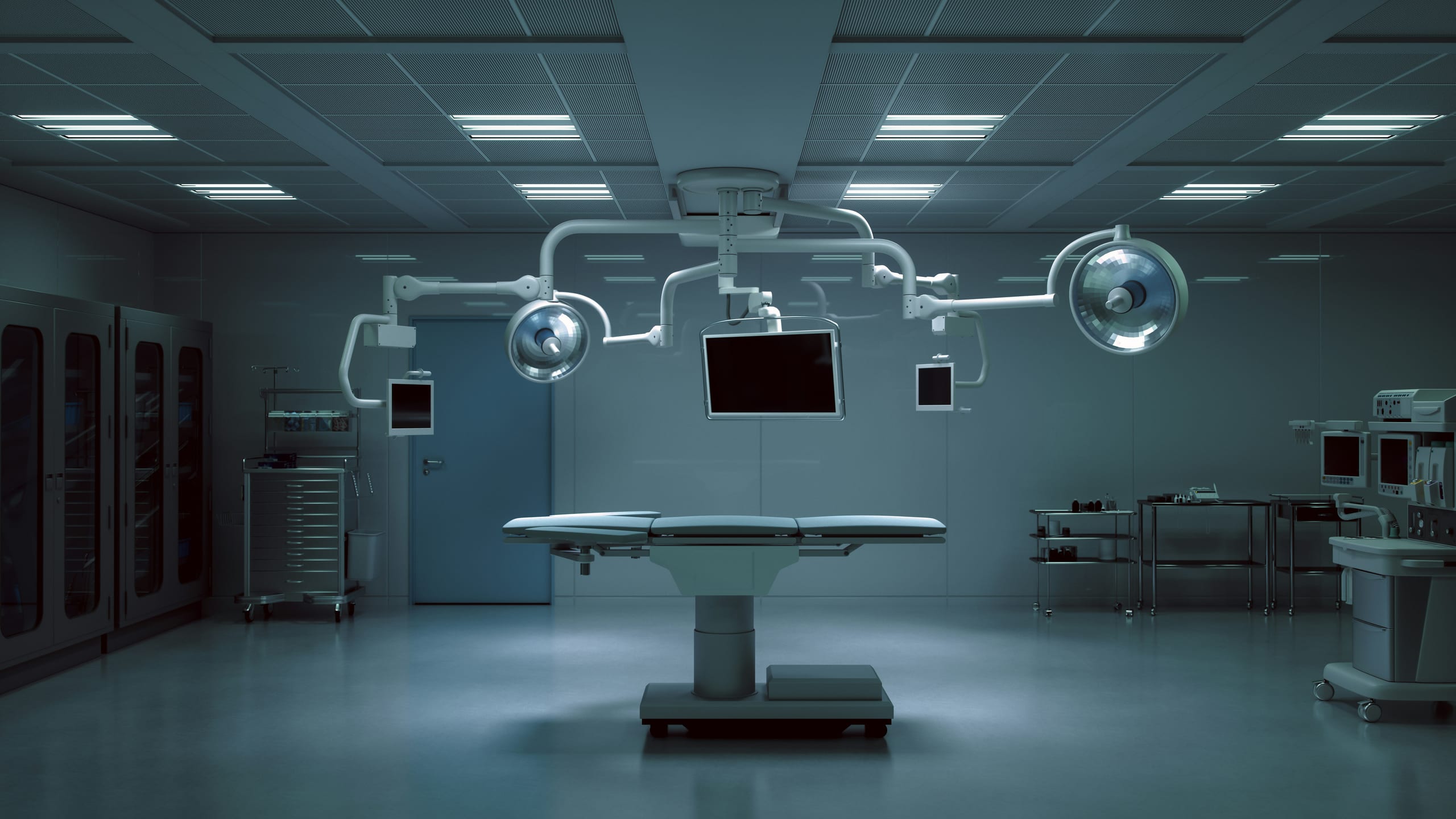 Modern ambulatory surgery center operating room with surgical lights